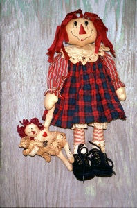 The instructions for this sweet 19" raggedy includes directions for turning a pre-made 8" muslin doll body into a mini raggedy for her to carry. The mini-raggedy holds a store bought 4" chenille bear.