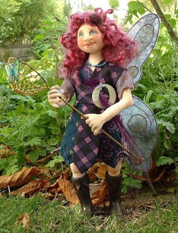Flurrie - fantastic 12" free-standing fairy has a needle sculpted face, fiber wings and wonderful paperclay boots. Pattern includes a CD with detailed construction photos.