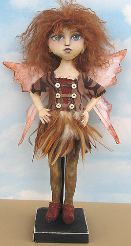A wonderful feather skirt and tyvek wings give this sassy 16” fairy lots of flair.