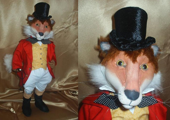This jaunty 21” free-standing fox has a lycra over cloth face colored with oil pastels.
