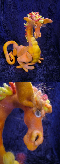This dragon with a toothy grin is 15” tall and 21” long.