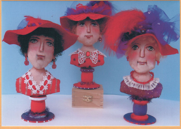 zesty 8” painted muslin Red Hat Ladies are perched on wooden spools sewing pattern
