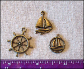 Steampunk Trinkets - Nautical Theme for Art Dolls - Bronze sailboat, ship's wheel,& rope circle sailboat