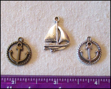 Steampunk Trinkets - Nautical Theme for Art Dolls - Silver Sailboat, silver ripe circle anchor, & bronze rope circle anchor